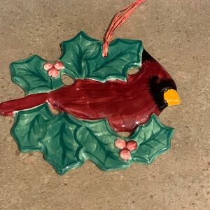Fabulous vintage Gail Pittman cardinal with Holly leaves. Mint, 6” x5”.